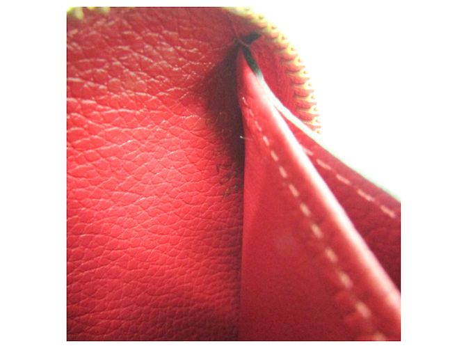 Cartera Zippy Monogram Empreinte Louis Vuitton M63691 Roja - vista 9