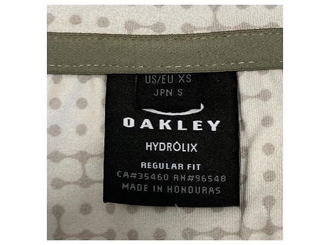Autre Marque Polo a Maniche Corte Grid Camo Oakley Beige - vista 5