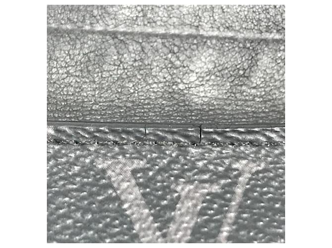 Billetera Compacta Discovery Monogram Eclipse Louis Vuitton Castaño Negro - vista 16