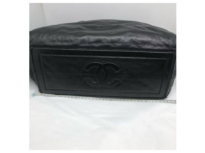 Chanel Coco Cocoon Tote Bag aus schwarzem, gestepptem Lammleder. - Ansicht 7
