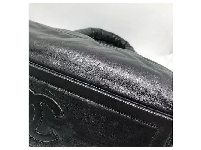 Chanel Coco Cocoon Tote Bag aus schwarzem, gestepptem Lammleder. - Ansicht 9