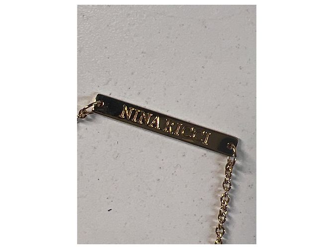 Set di 2 bracciali Nina Ricci Metallo Dorato e Cordino - vista 3