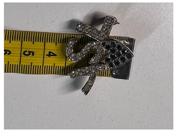 Yves Saint Laurent Spilla YSL in metallo argentato e strass Argento - vista 8