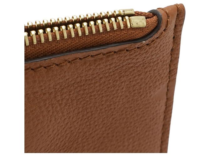 Pochette Neverfull MM in Monogram Empreinte Louis Vuitton Cognac - vista 7