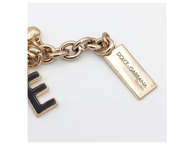 Delizioso bracciale DOLCE & GABBANA acciaio dorato charms "Desire" Nero Bianco D'oro - vista 3