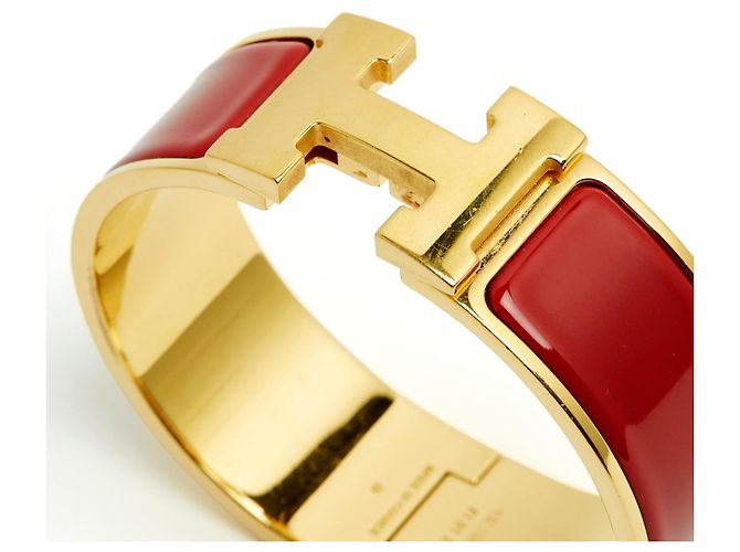 Clic H Bracciale Dore Rosso Clic Clac H di Hermès
Bracciale in Metallo Dorato e Smalto Rosso Hermes D'oro - vista 3