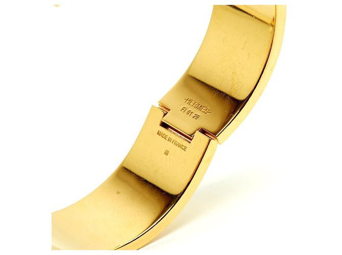 Clic H Bracciale Dore Rosso Clic Clac H di Hermès
Bracciale in Metallo Dorato e Smalto Rosso Hermes D'oro - vista 6