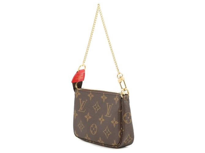 Mini Pochette Accessoires Vivienne Natale Monogramma Marrone Louis Vuitton - vista 2