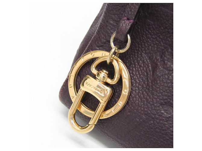 Borsa a Spalla Artsy MM in Monogram Empreinte di Louis Vuitton - vista 11