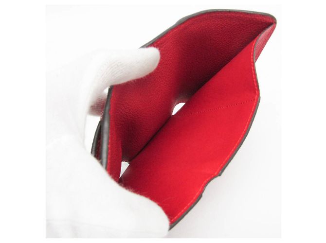 Billetera Compacta Pont Neuf Monogram Empreinte Louis Vuitton Roja Fucsia - vista 13