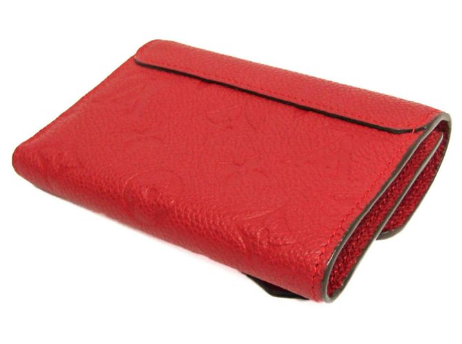 Billetera Compacta Pont Neuf Monogram Empreinte Louis Vuitton Roja Fucsia - vista 2