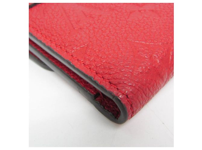 Billetera Compacta Pont Neuf Monogram Empreinte Louis Vuitton Roja Fucsia - vista 5