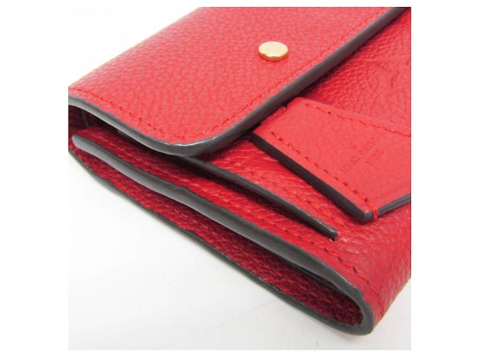 Billetera Compacta Pont Neuf Monogram Empreinte Louis Vuitton Roja Fucsia - vista 6