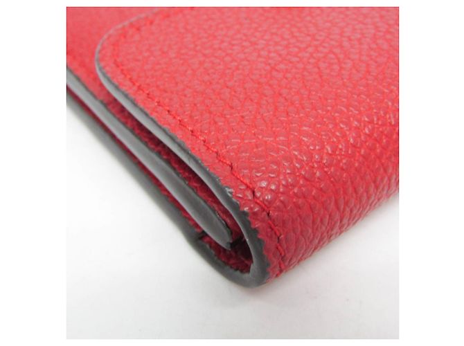 Billetera Compacta Pont Neuf Monogram Empreinte Louis Vuitton Roja Fucsia - vista 8