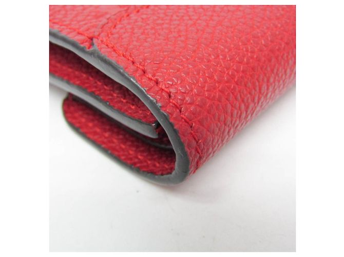 Billetera Compacta Pont Neuf Monogram Empreinte Louis Vuitton Roja Fucsia - vista 9