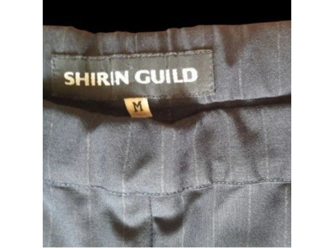 Autre Marque Pantalones de rayas Shirin Guild negros de pierna ancha - vista 3