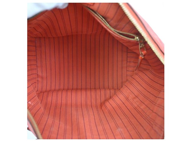 Borsa Lumineuse in pelle Monogram Empreinte PM Louis Vuitton Rosso - vista 5