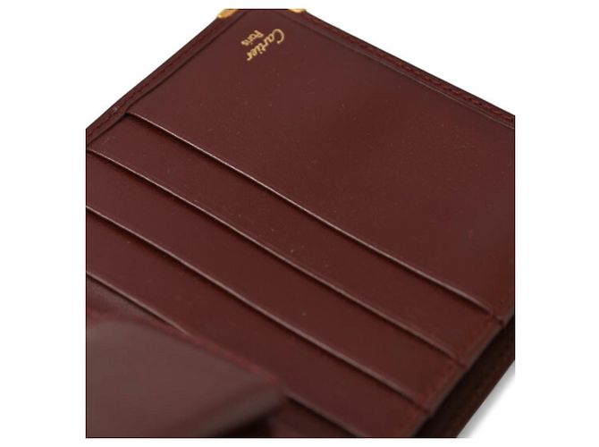 Portafoglio bi-fold Must de Cartier da uomo in bordeaux - vista 11