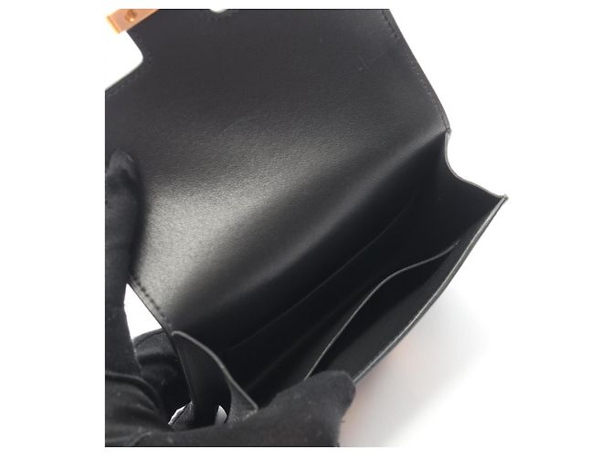 Hermès Billetera Bifold Slim Constance Hermes Negro - vista 3