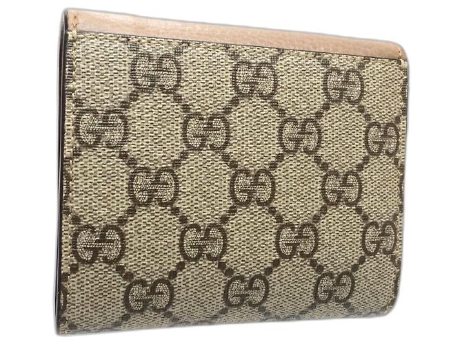 Billetera bi-fold Double G de GUCCI en beige - vista 3