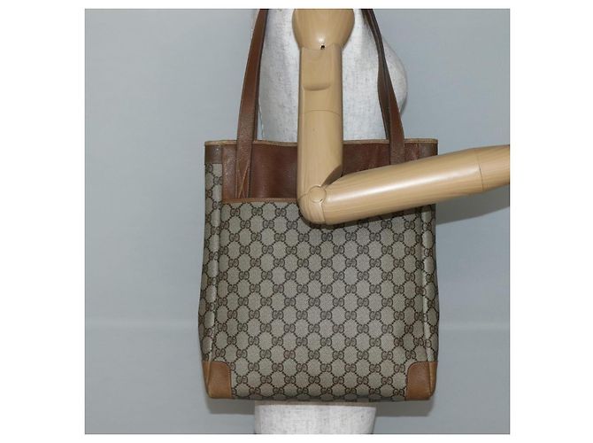 Gucci Borsa Tote GG Supreme in PVC beige e oro 002 37 0035 Auth 143269 D'oro - vista 23