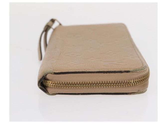 Cartera Zippy Monogram Empreinte LOUIS VUITTON Beige M61866 Auth bs31261 - vista 3