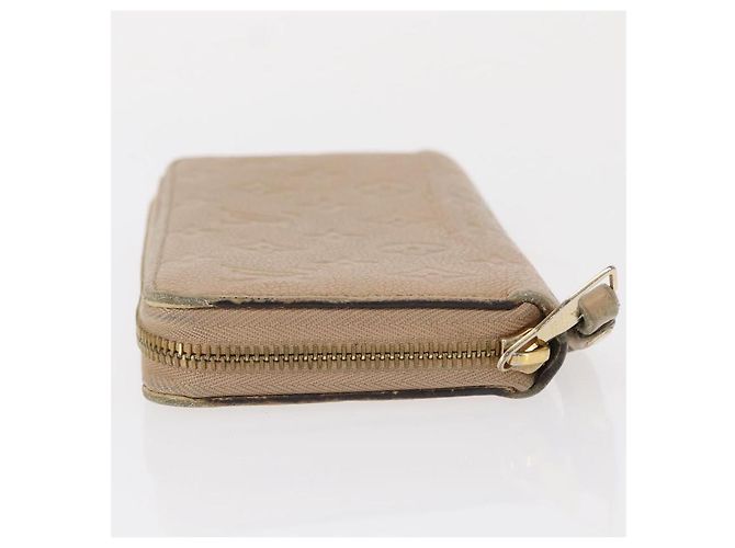 Cartera Zippy Monogram Empreinte LOUIS VUITTON Beige M61866 Auth bs31261 - vista 4