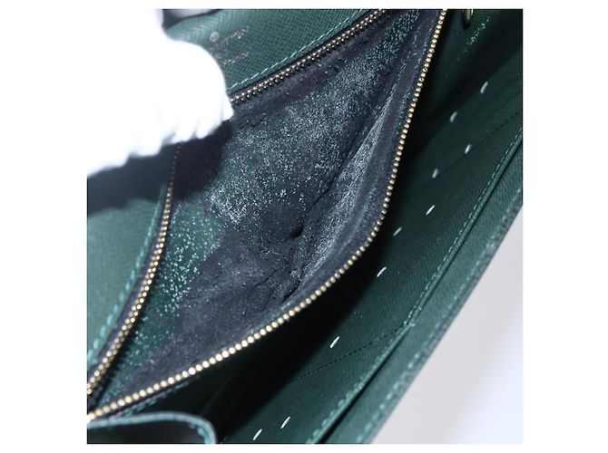 LOUIS VUITTON Pochette Kourad in Taiga Borsa Clutch Épicea M30194 LV Auth th6532 - vista 10