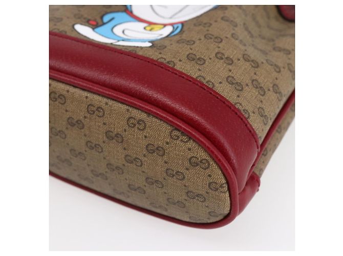 Gucci Mini borsa a secchiello Doraemon Micro GG Supreme in PVC beige 647801 Auth 154926SAM D'oro - vista 10