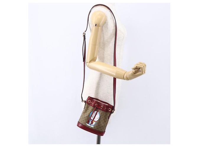 Gucci Mini borsa a secchiello Doraemon Micro GG Supreme in PVC beige 647801 Auth 154926SAM D'oro - vista 20