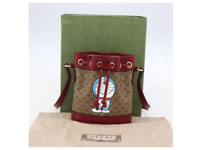 Gucci Mini borsa a secchiello Doraemon Micro GG Supreme in PVC beige 647801 Auth 154926SAM D'oro - vista 21