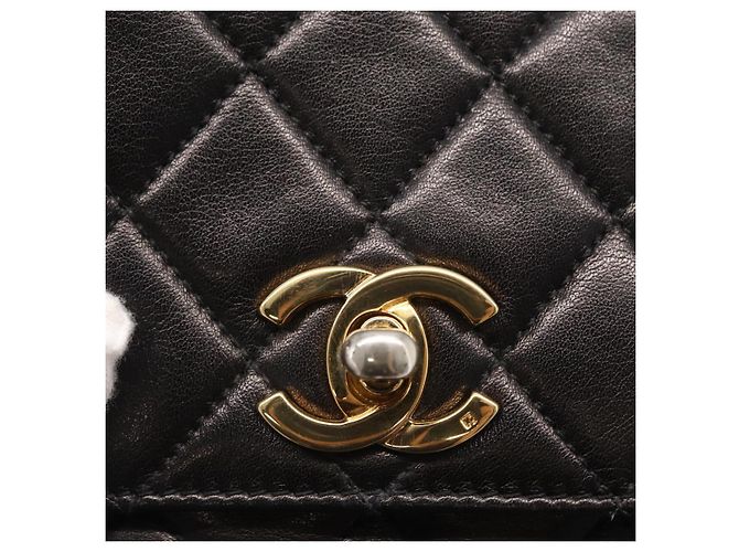 CHANEL Borsa a vita Matelassé in pelle di agnello nera oro CC Auth 156628V Nero D'oro - vista 10