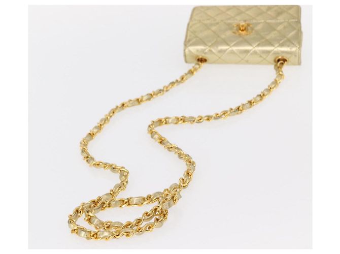 CHANEL Mini Matelassé Borsa a Spalla con Catena in Pelle di Agnello Oro CC Auth 152962 D'oro - vista 8