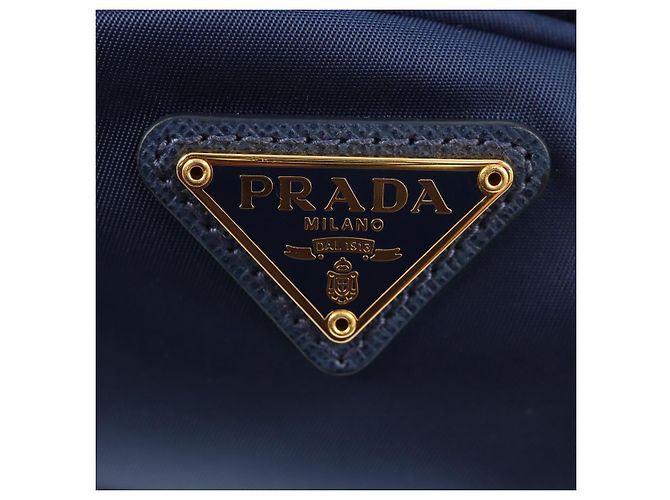 Borsa Clutch PRADA in nylon blu e oro Auth SW1822V D'oro - vista 17