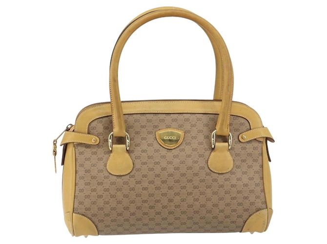 Gucci Borsa a mano Micro GG Supreme in PVC beige e oro 000 106 1325 Auth 157759 D'oro - vista 2