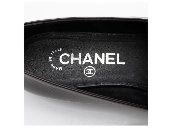Gabrielle Mocassini a punta cap in pelle di capra screpolata con charm CC di Chanel Nero - vista 7