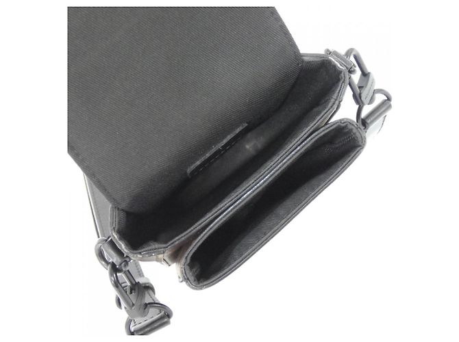Portafoglio verticale indossabile S-Lock Monogram Macassar di Louis Vuitton Marrone Nero - vista 7