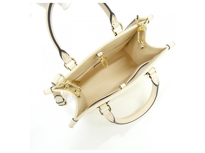 On-the-Go PM Handtasche aus Monogram Empreinte von Louis Vuitton Beige - Ansicht 4