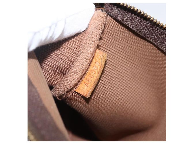 Pochette Accessoires NM en lona Monogram Louis Vuitton Castaño - vista 7