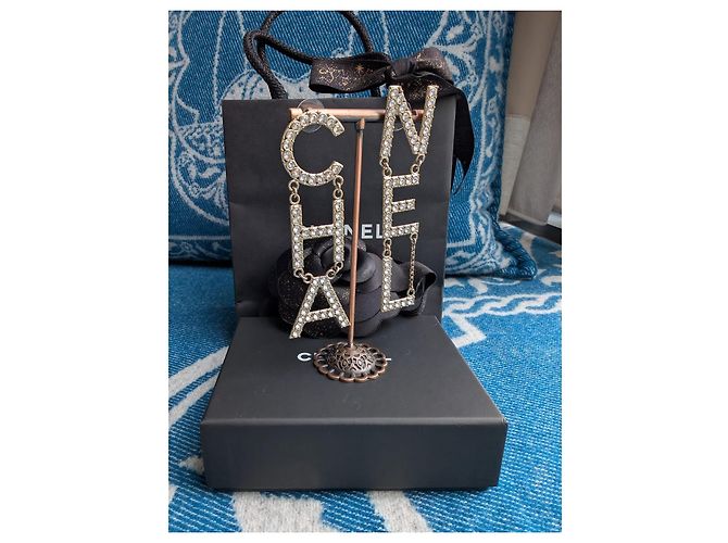 Chanel Orecchini in cristallo lettera GHW B21V CHA NEL D'oro - vista 13