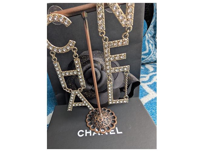 Chanel Orecchini in cristallo lettera GHW B21V CHA NEL D'oro - vista 15
