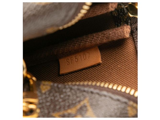 Mini Pochette Accessoires Monogram Marrone Louis Vuitton - vista 6