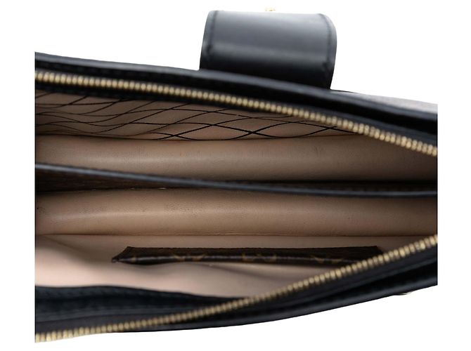 Clutch Trunk Monogramma Inverso Marrone Louis Vuitton - vista 4