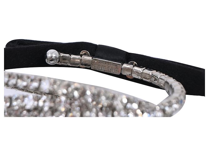Bracciale Miu Miu in metallo argento decorato con fiocchi e diamanti D'oro Metallico - vista 5