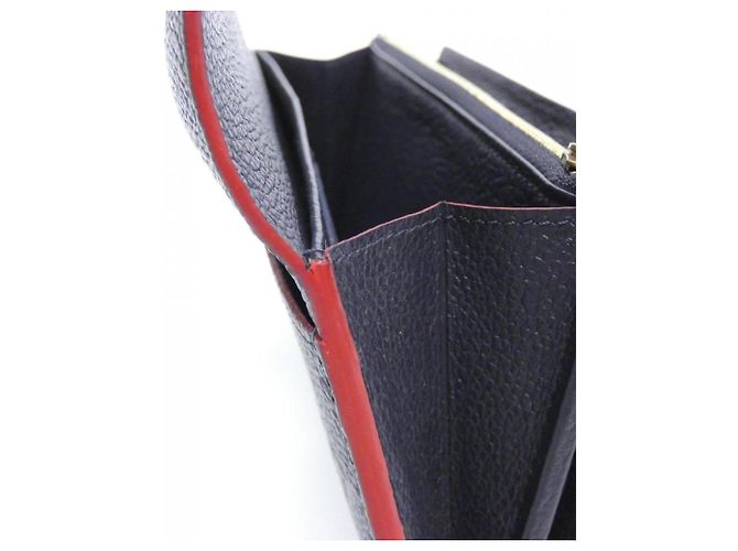 Cartera Sarah Monogram Empreinte Louis Vuitton Roja - vista 4