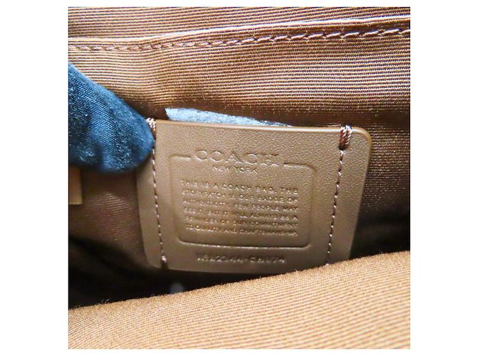 Borsa a Spalla in Tela e Pelle Hudson Small Pack di Coach Marrone - vista 10