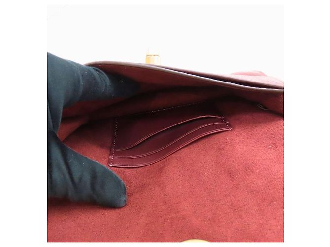 Pochette in pelle martellata Coach Originals Rosso - vista 5