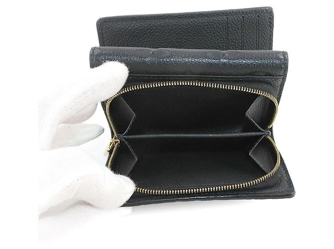 Metis Compact Tri-Fold Geldbörse aus Monogram Empreinte von Louis Vuitton Schwarz - Ansicht 7