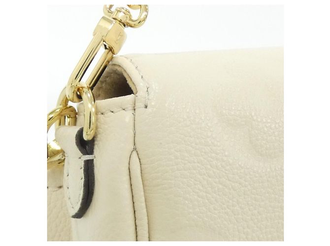 Carteira Louis Vuitton Monogram Empreinte Wallet on Chain Ivy Cru - vista 7
