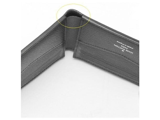 Slender Portafoglio bi-fold in pelle Taiga Louis Vuitton Nero - vista 6